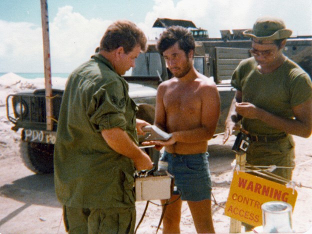 Paul Griego, being scanned by Geiger counters upon returning from working on Runit Island, 1978